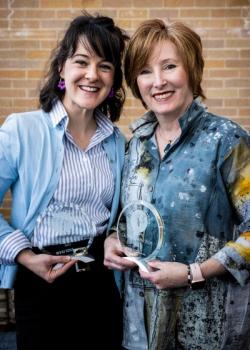 Flox and Francis pose with award